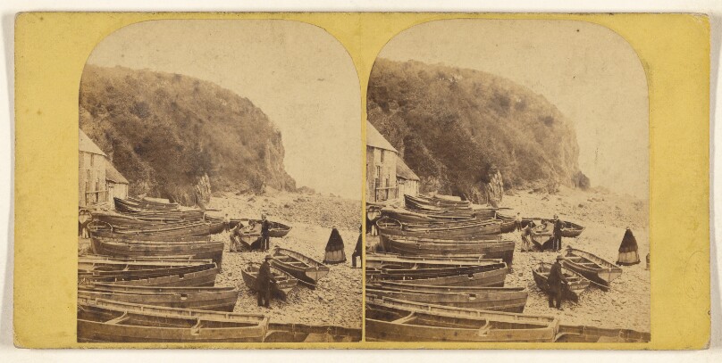 [View of shoreline with numerous rowboats, some people standing, possibly at Ilfracombe, England (?)]