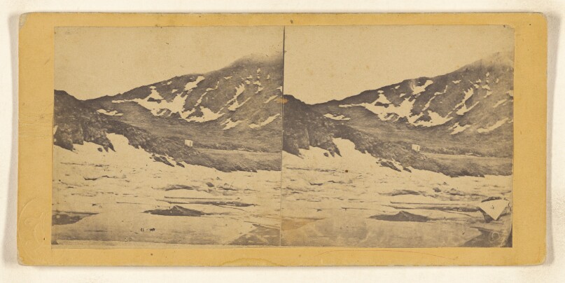 [View of snow-covered mountains in either Iceland or Greenland]