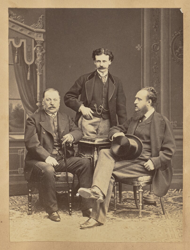 [Portrait of three men]