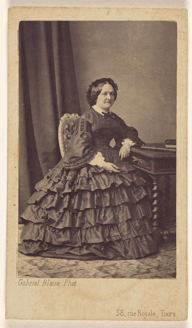[Unidentified woman, seated]