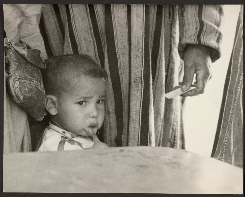 Untitled (young child receiving medical check-up, Morocco)