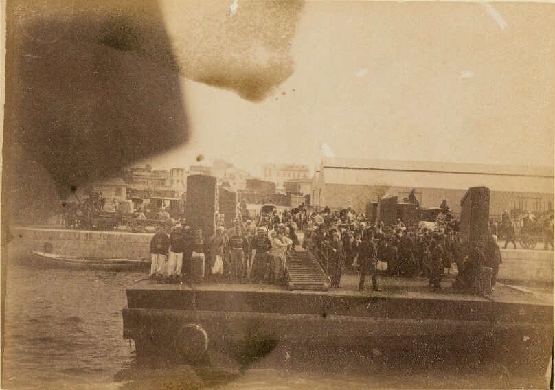 [Group of people on barge]