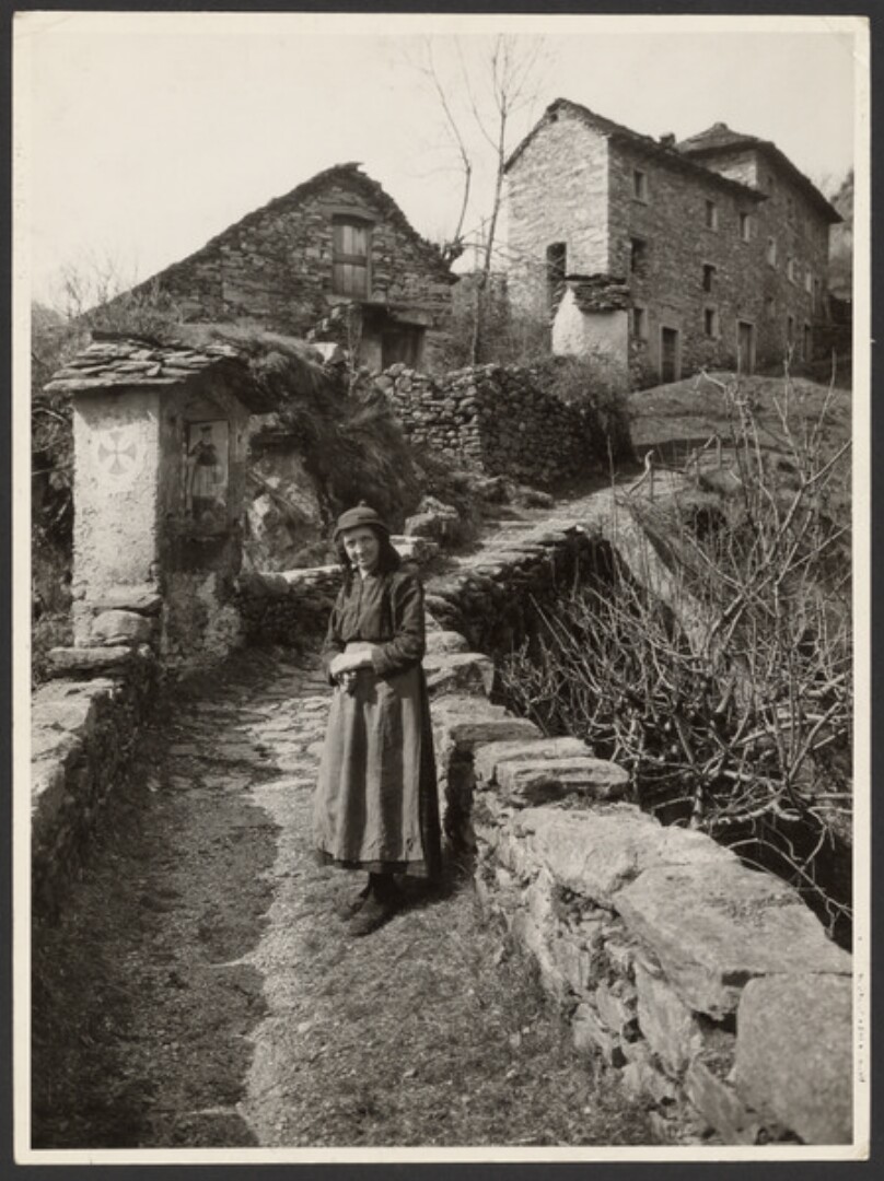 [Woman and homes in Centovalli, southern Switzerland]