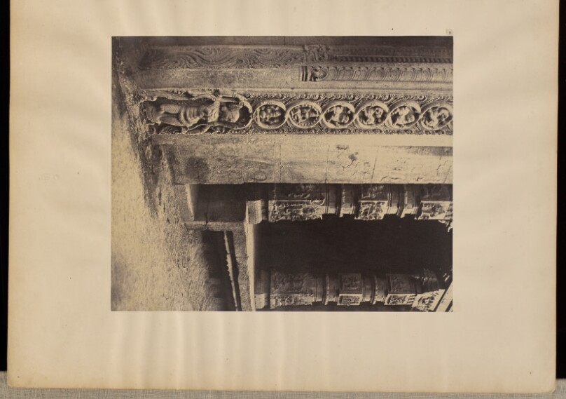 Madura. Pillars in the Recessed Portico in the Roya Gopurum with the Base of One of the Four Sculptured Monoliths.