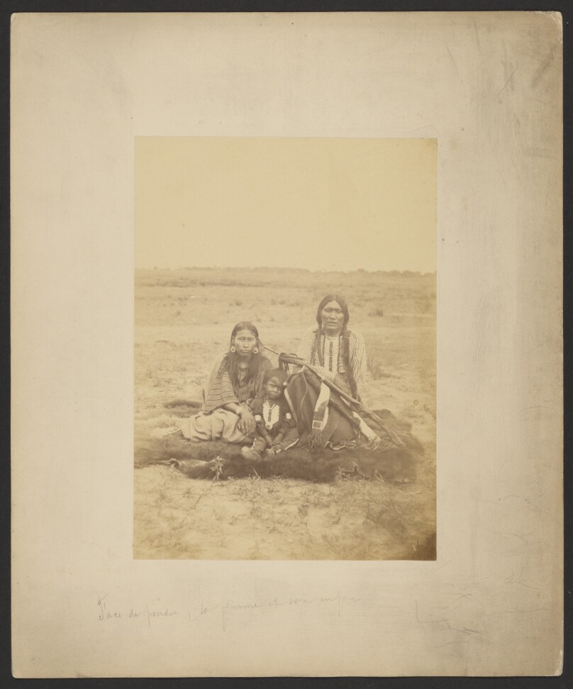 [Arapaho Chief Powder Face, His Wife, and Their Son]