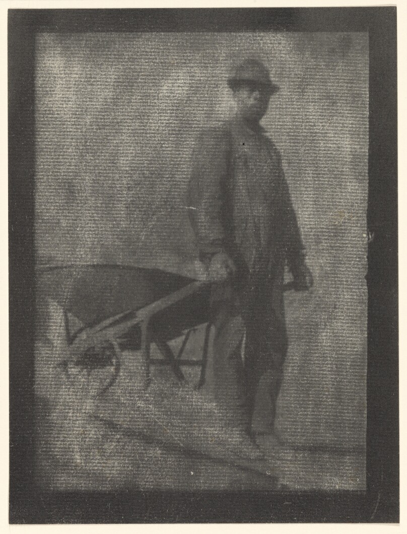 [Black Man with Wheelbarrow]