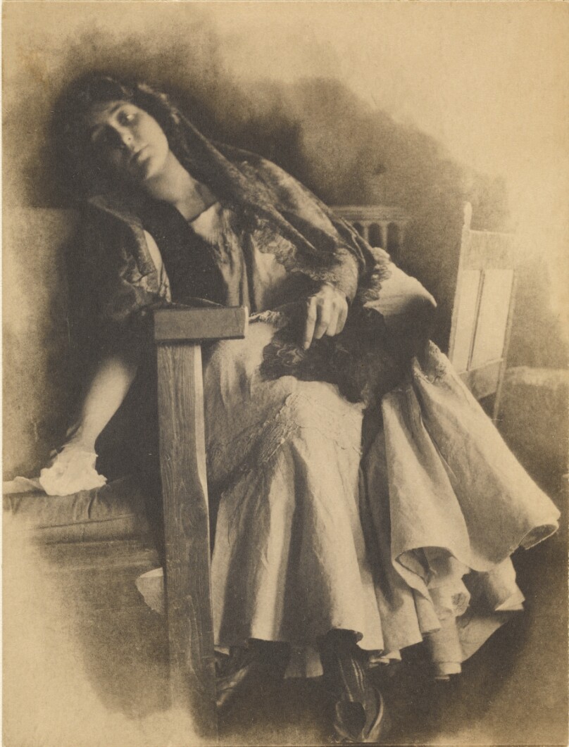 [Woman in chair]