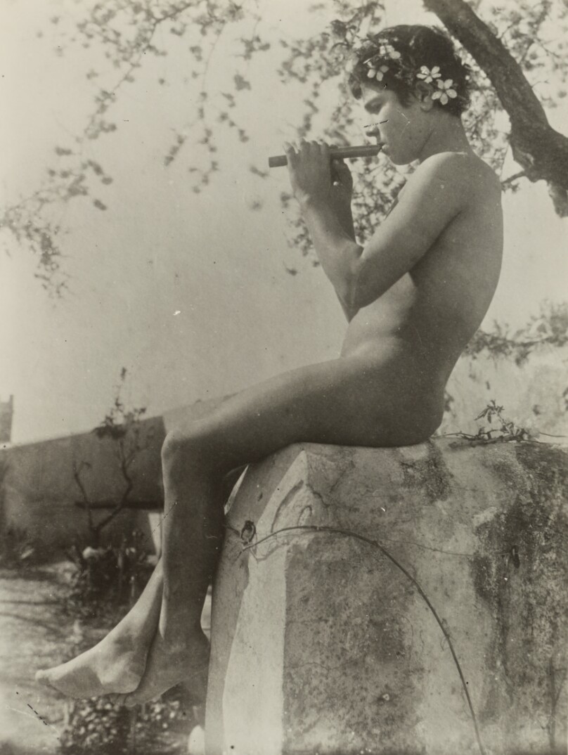 [Boy playing flute]