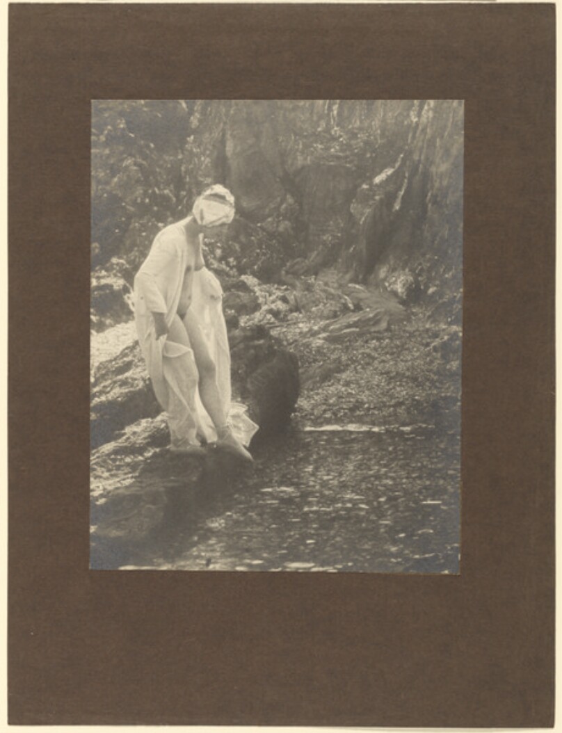 [Female nude by river]