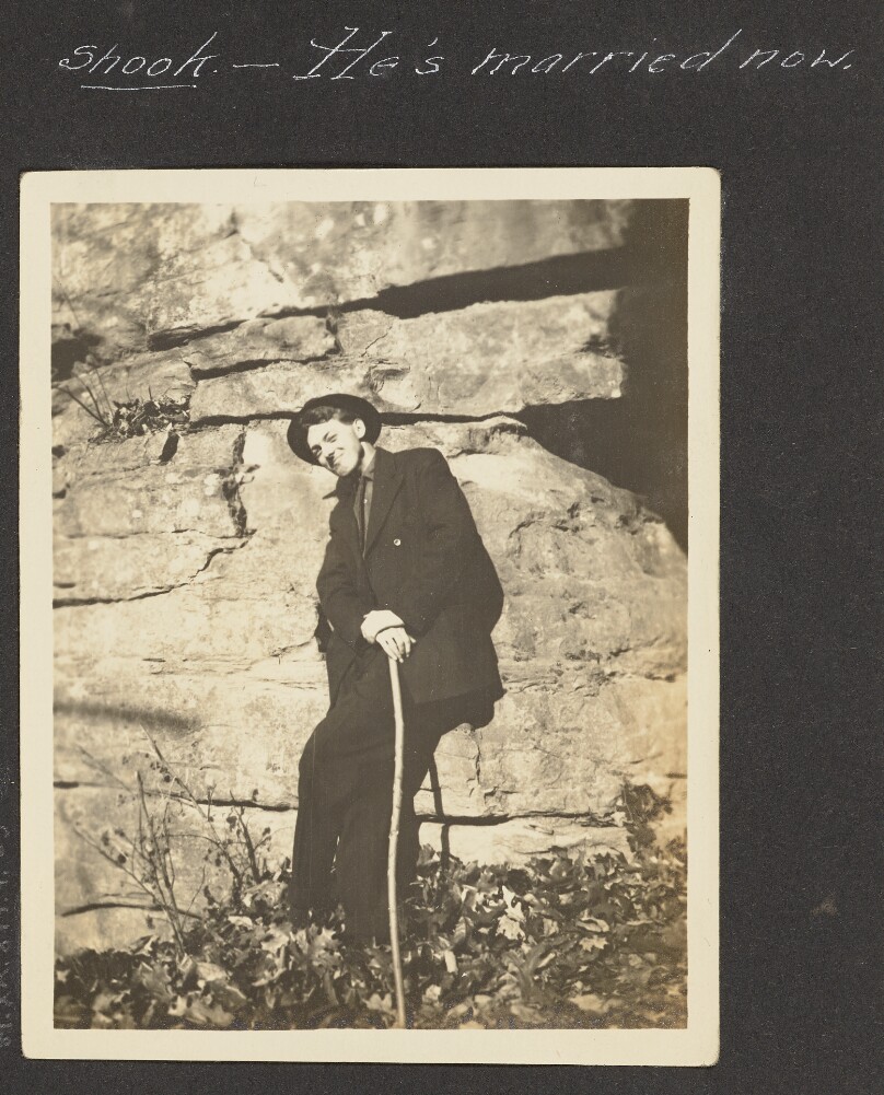 [View of Man Posing Against Boulder]