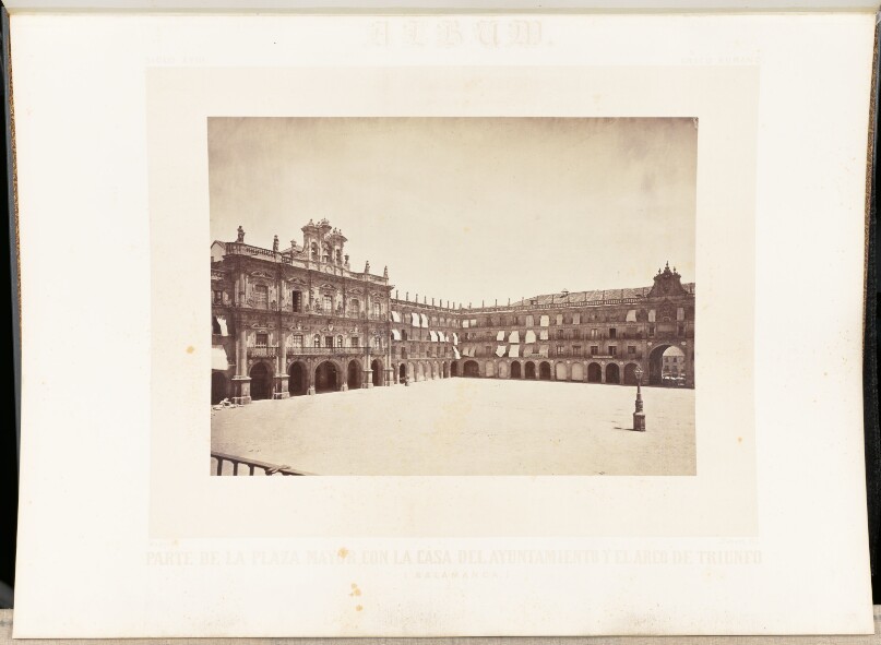 Part of the main square, with the town hall and triumphal arch.