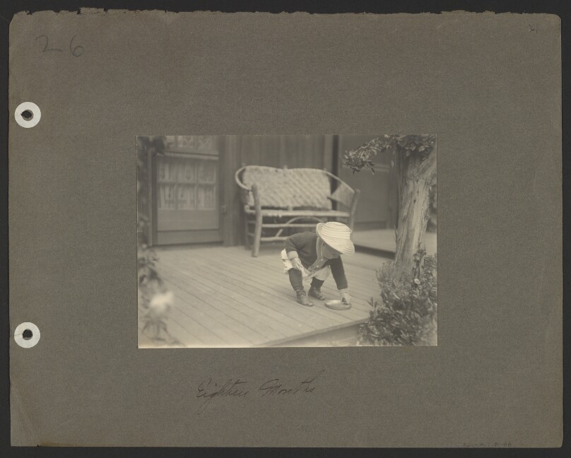 [Chandler Weston wearing straw hat, dish on floor]