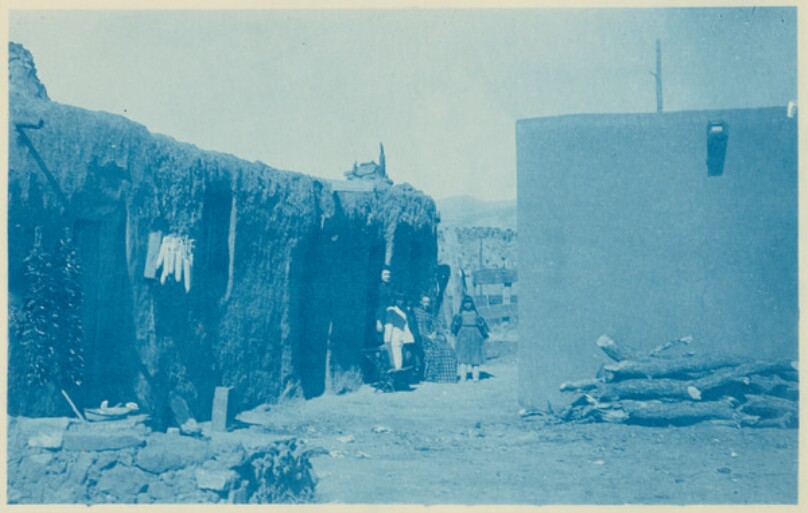 [Isleta, New Mexico: Exterior View of Houses with Eve and her Sister]