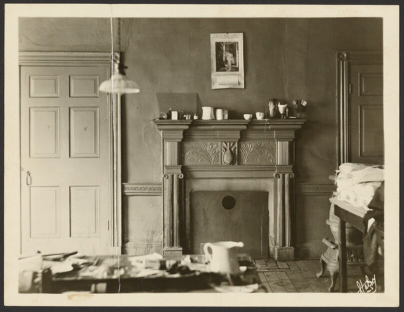 [Interior of room with fireplace]