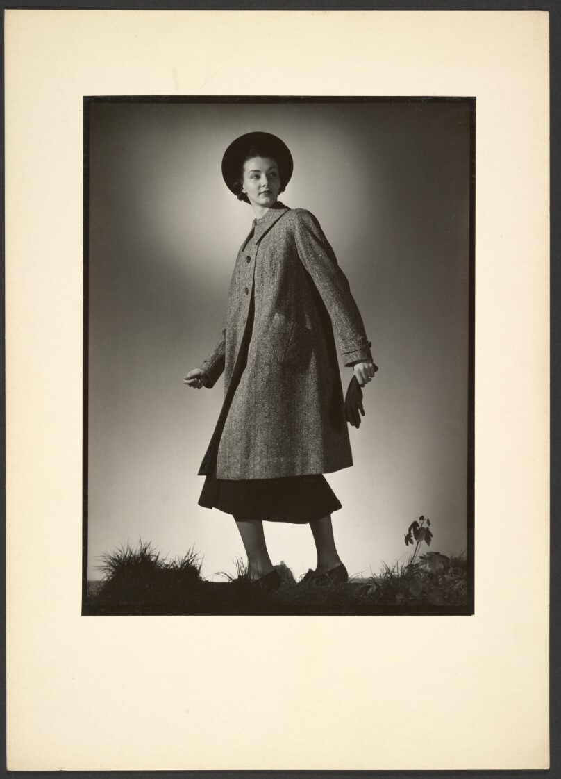 [Woman modeling coat]
