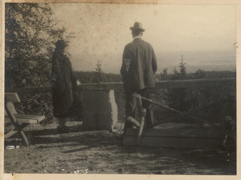 [Man and woman at a viewpoint]