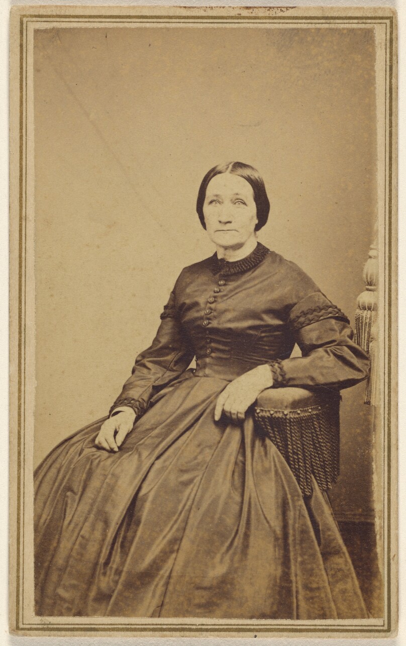 [Unidentified woman, seated]