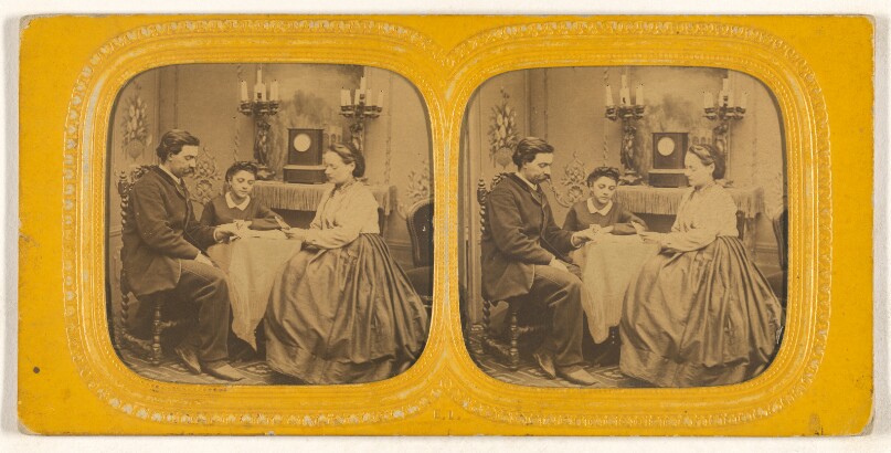 [Family playing cards]