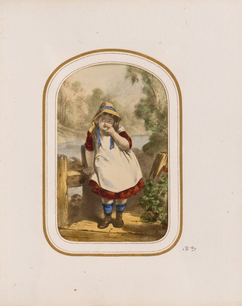 [Young girl standing on a bridge]
