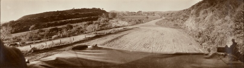 [Panoramic view down road]