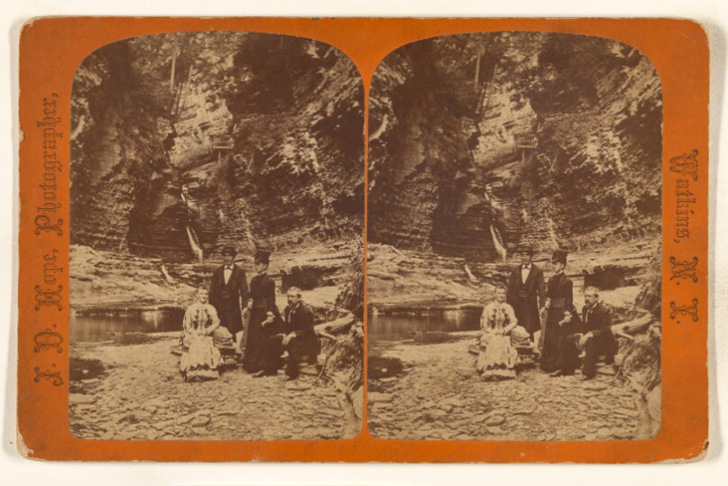 [Family group portrait, posed in natural setting on rocks]