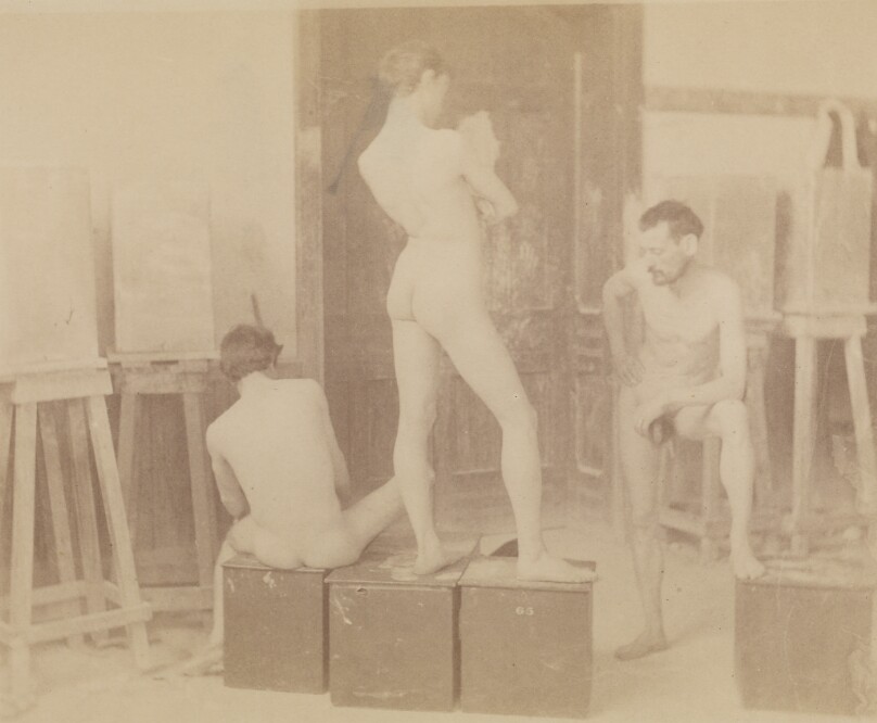 [Three nude models in painting studio]