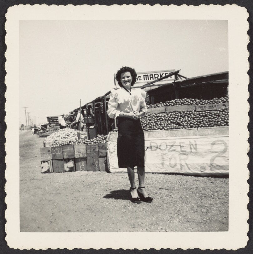 [Woman at market]