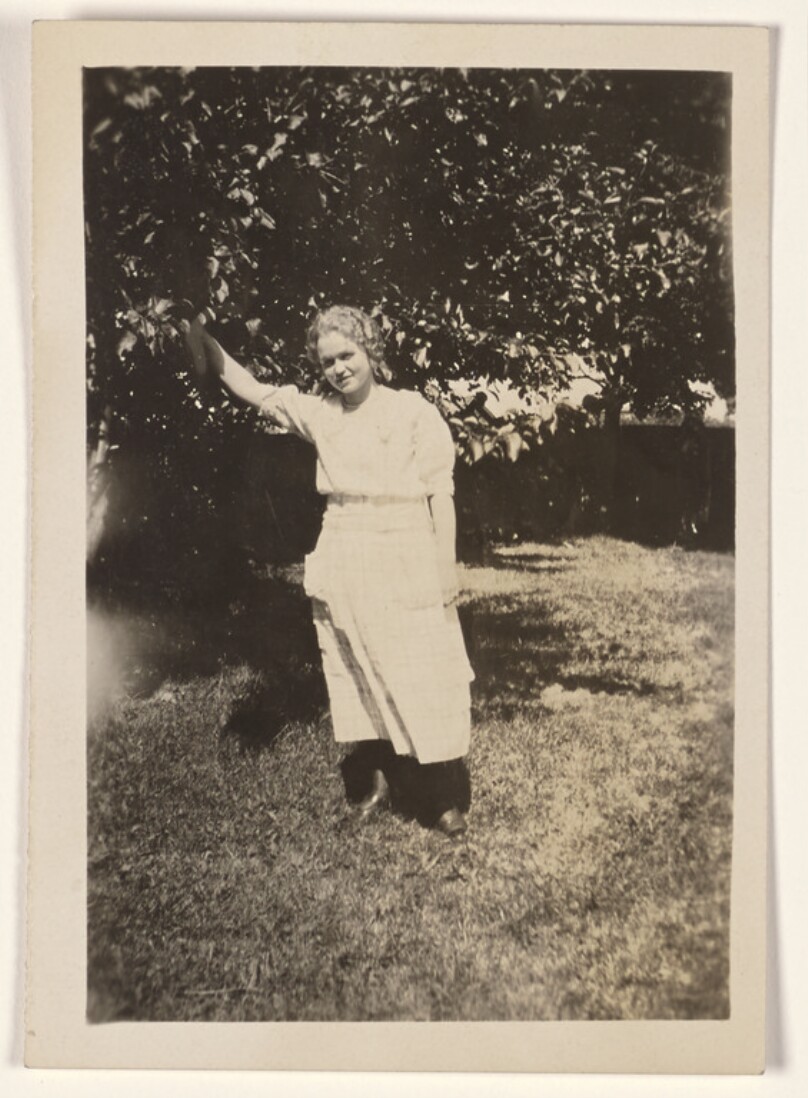 [Woman posing]