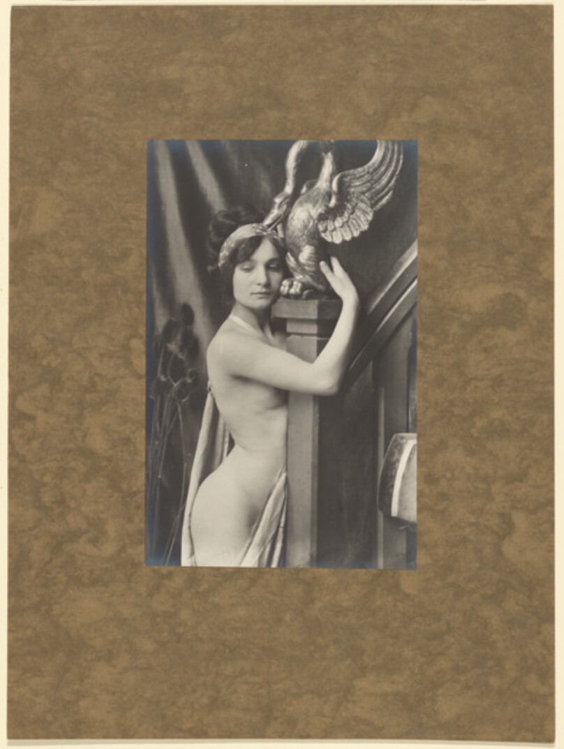 [Female nude with swan statue]