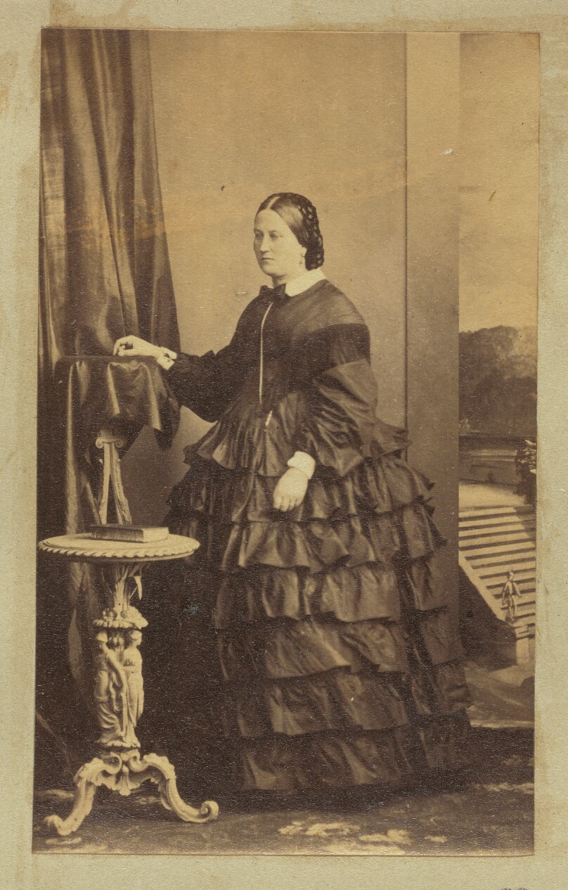 [Portrait of woman in ruffled dress]