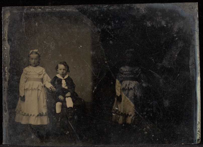 [Double portrait of two children]
