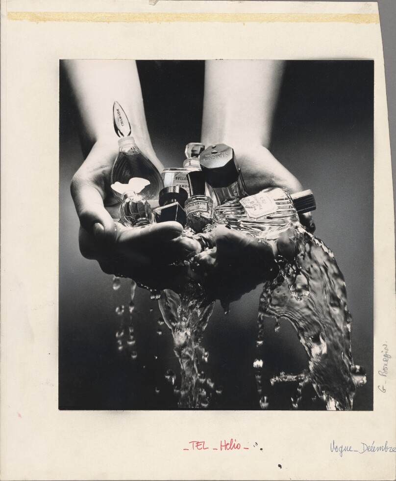 Hands Holding Perfumes