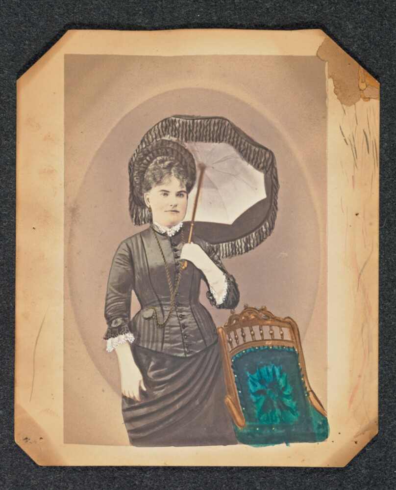 [Portrait of woman with parasol]