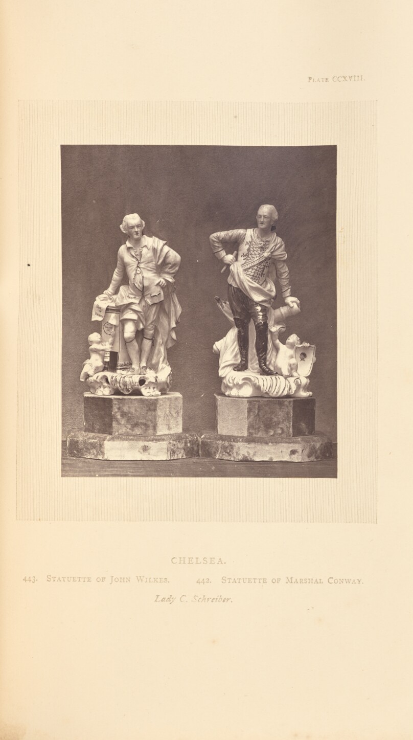 [Two statuettes]