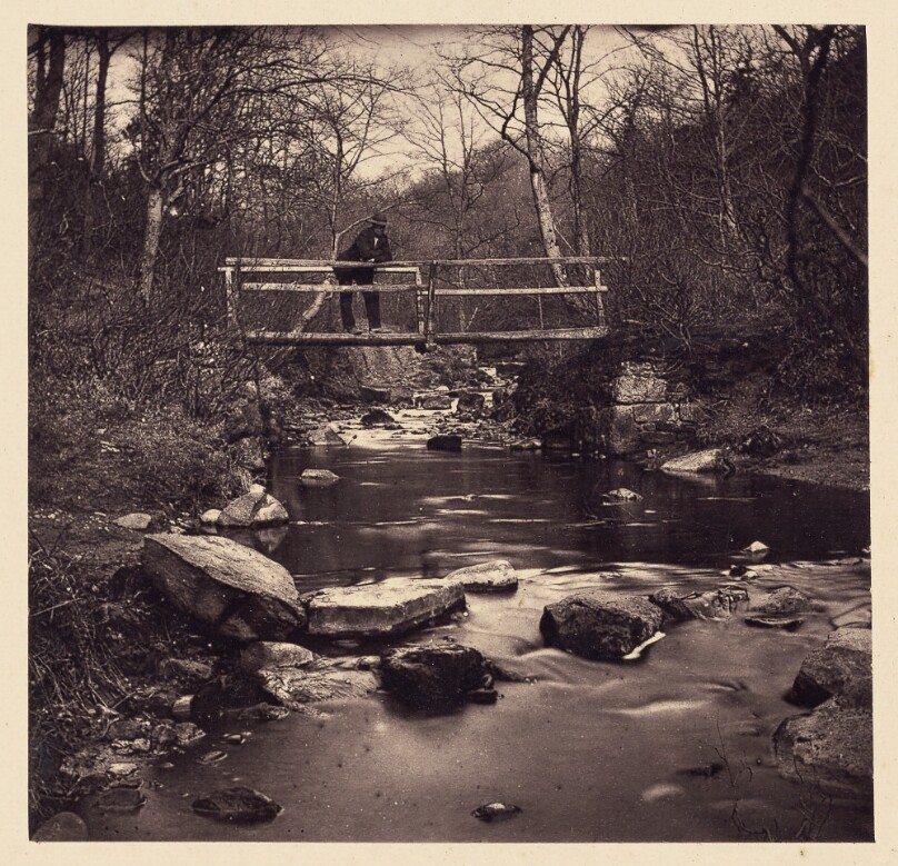 [Man on bridge]