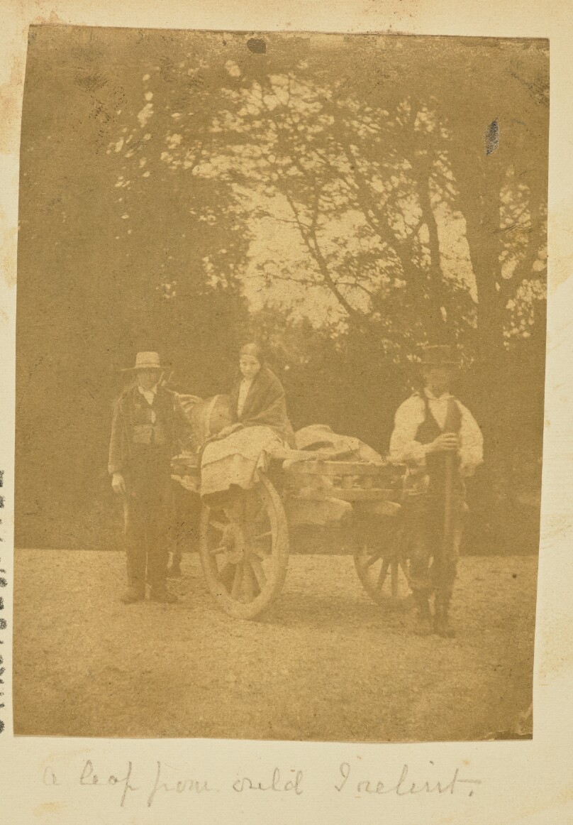 [Group posing with horse-drawn cart]