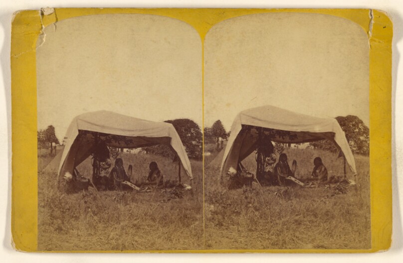 Arapaho Chief "Bear Robe" and his lady's camp Ind. Terr. Sep/75