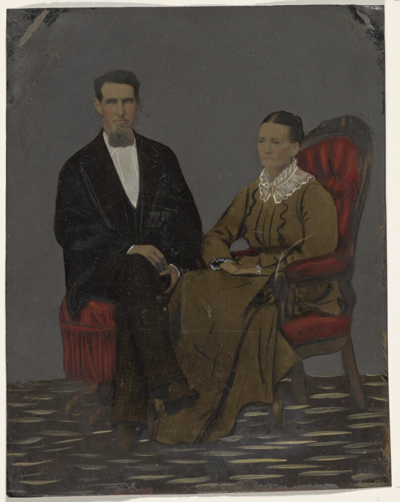 [Portrait of seated couple]