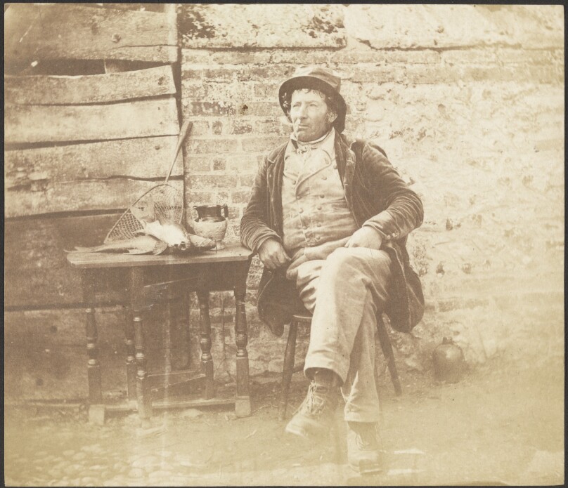 [Seated Man]