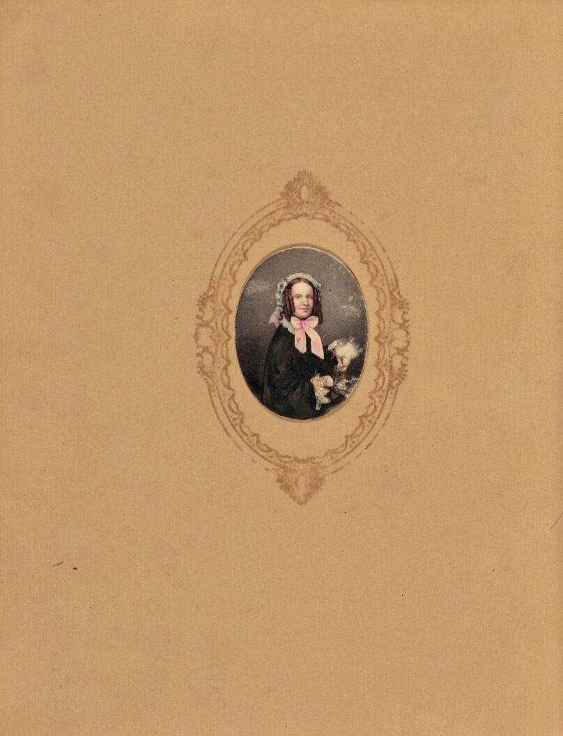 [Portrait of a young woman with curls]