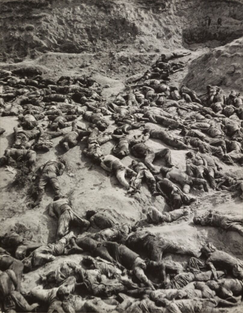 Korean civilians in a gully near Taejon were massacred by retreating N. Korean forces in 1950