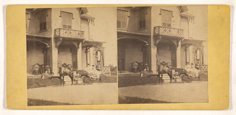 [House, two women seated in horse-drawn carriage in front, another woman seated on porch]
