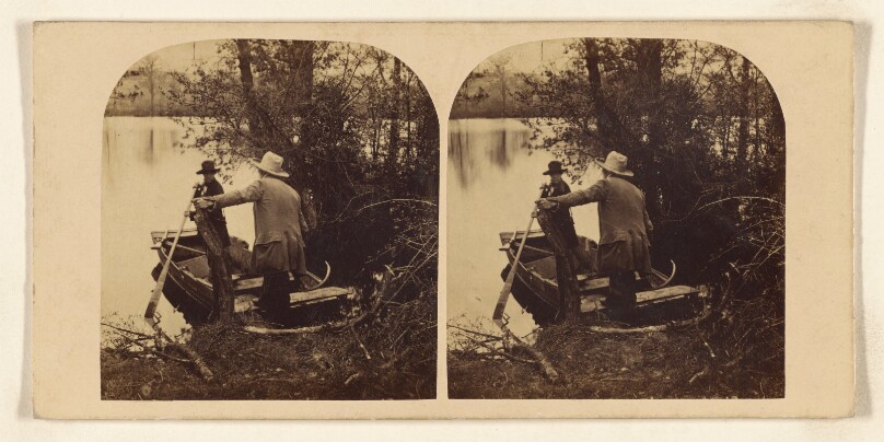 [Two men in a rowboat on lake shore about to take off]