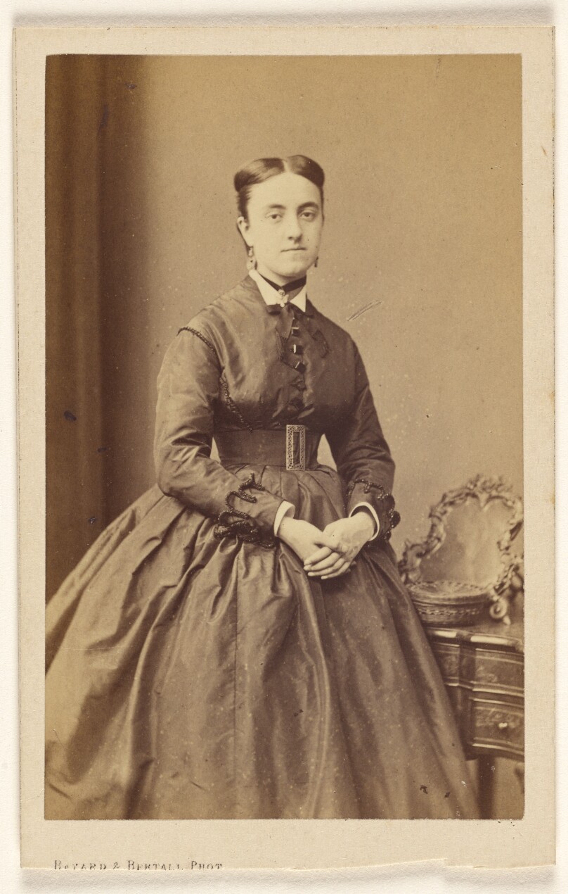 [Unidentified woman, standing]