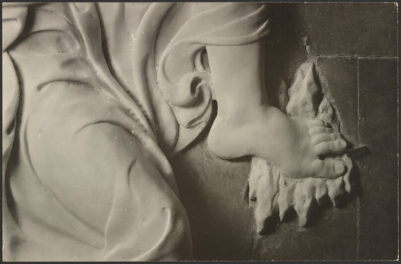 [Sculptural detail: foot]