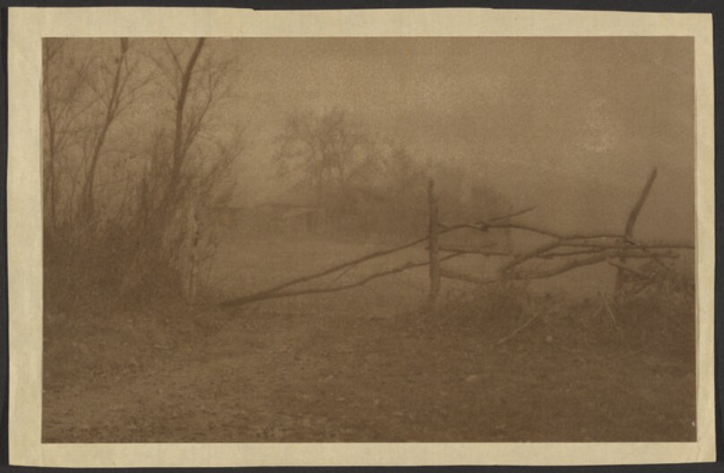 [Fence with House in Background]