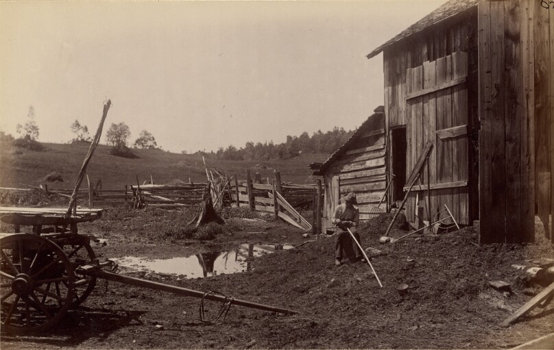 [Man working in farmyard]