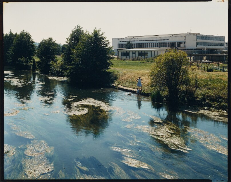 [Woman, child, and dog on banks of River Husine]