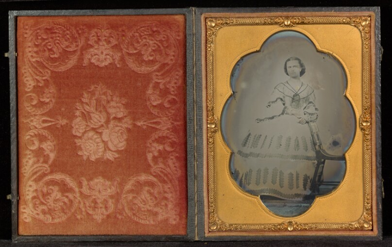 [Full-Length Portrait of a Woman in a White Dress Next to a Chair]