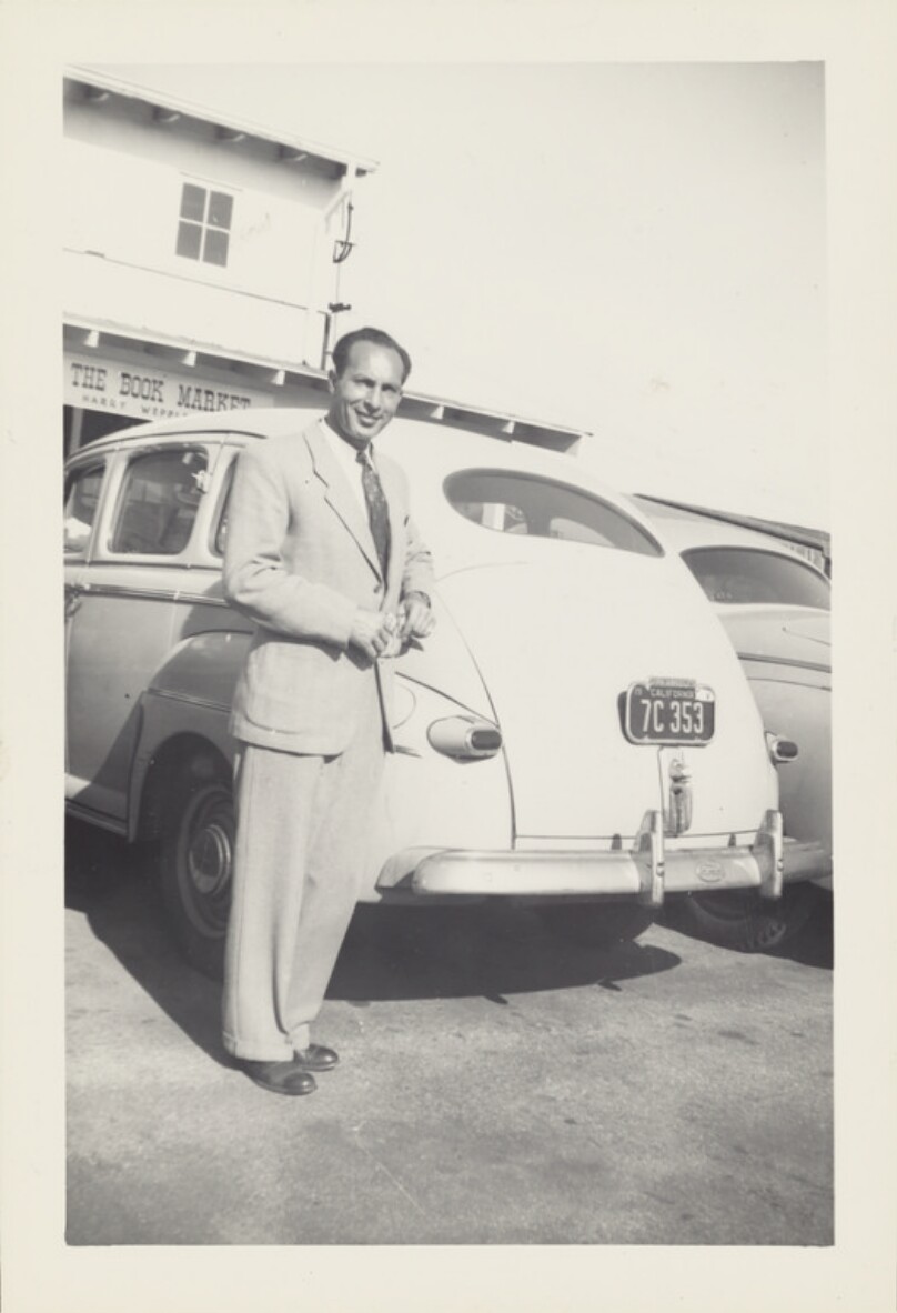 [Man standing outside The Book Market]